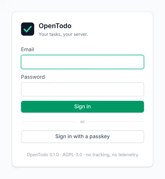 The sign-in screen with email and password fields and a Sign in with a passkey button below.
